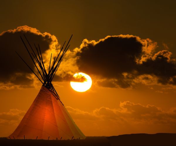 A teepee at sunset