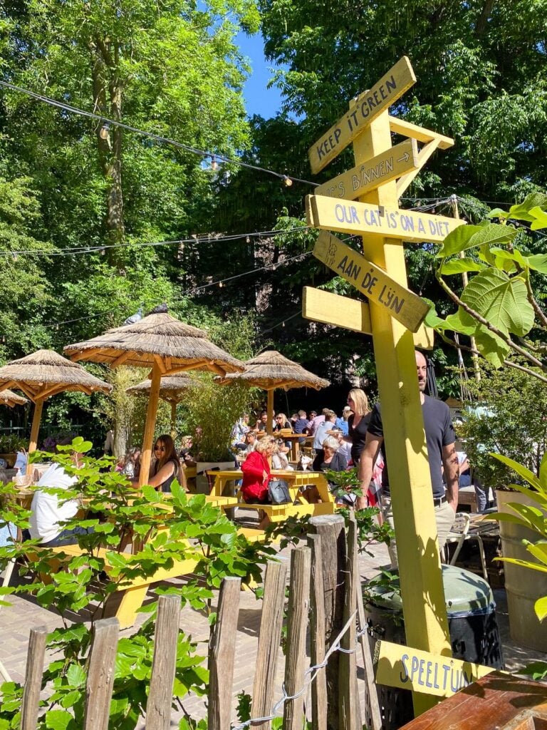 Vondeltuin Café in Vondelpark, Amsterdam - Serene terrace with rustic charm and vibrant community spirit