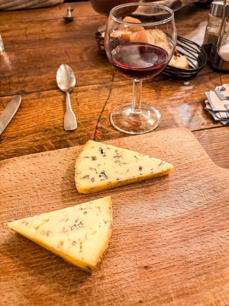 Authentic Parisian cheese and wine tasting in a rustic Parisian bistro