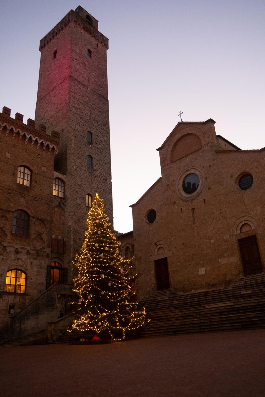 Christmas tree lights at dusk in San Gimignano, Italy