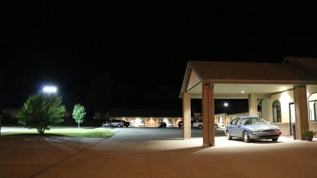 Vision Inn Motel exterior at night