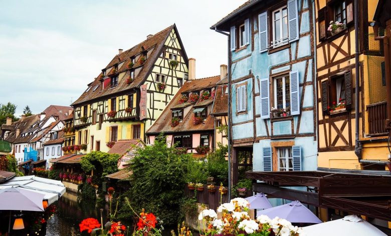 Charming La Petite Venise, Colmar, France with colorful half-timbered houses and canal reflections